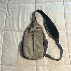 Black and Tan Crossbody Bag with Slim Profile and Minimalist Design NWOT